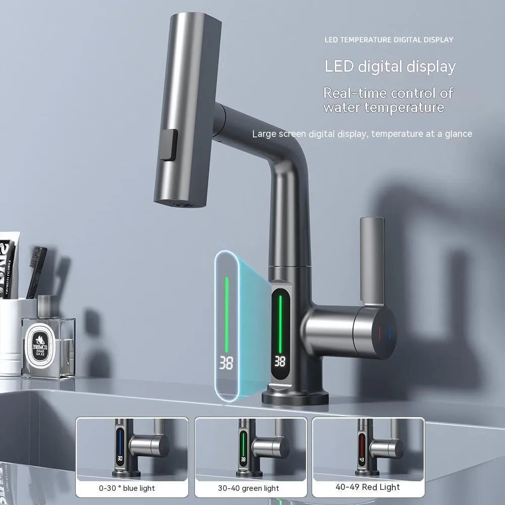 Digital display kitchen tap with pull-out spray hose showing temperature readout
