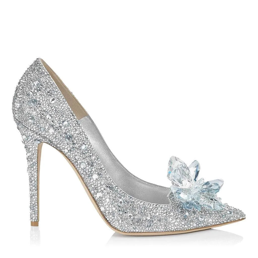 Gold women's pointed toe stiletto heels with sequin and rhinestone decoration on a shallow mouth.