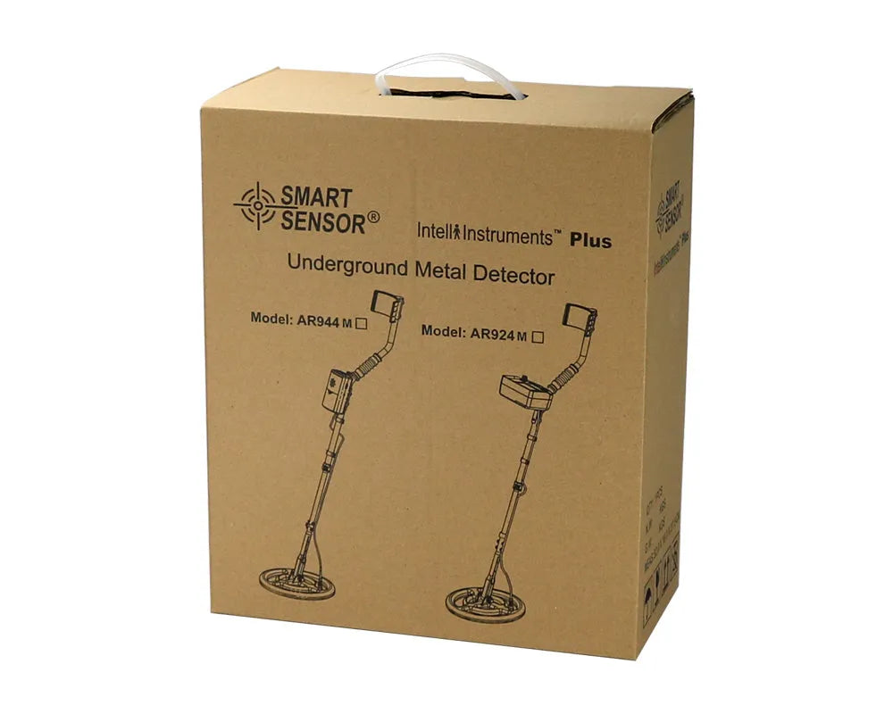 AR944M underground metal detector in black with search coil, adjustable shaft, and control box on grass