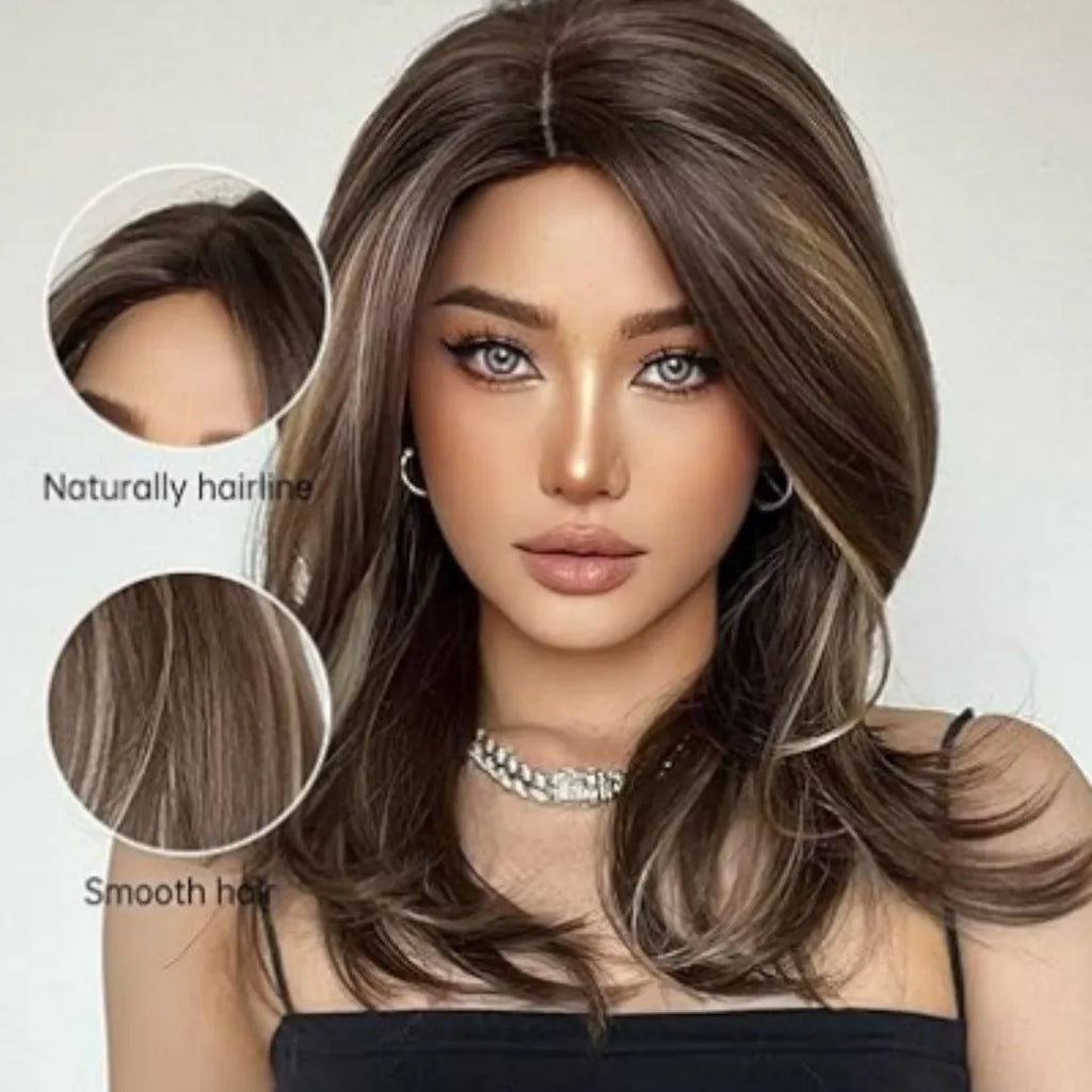 Mid-length curly synthetic wig with long bangs in a platinum gradient colour
