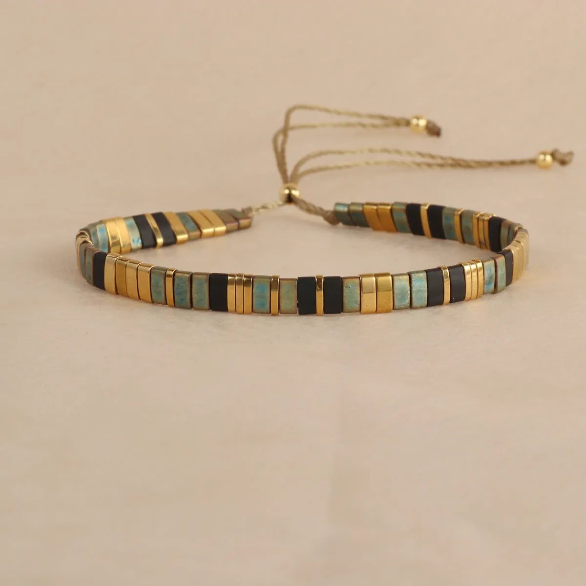 Geometric glass beaded bracelet with pull beads in five colour options