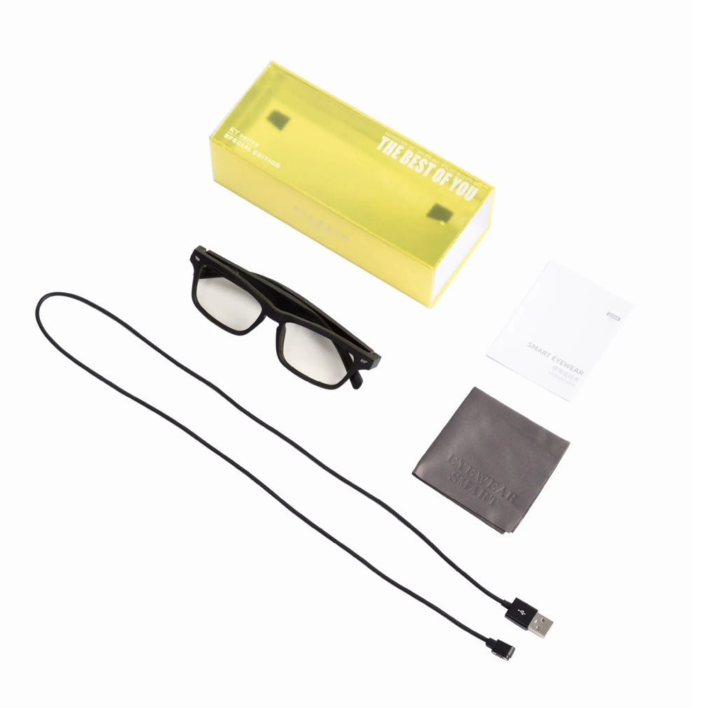 Smart glasses with semi-open Bluetooth audio speakers on temples and dark UV400 protective lenses.