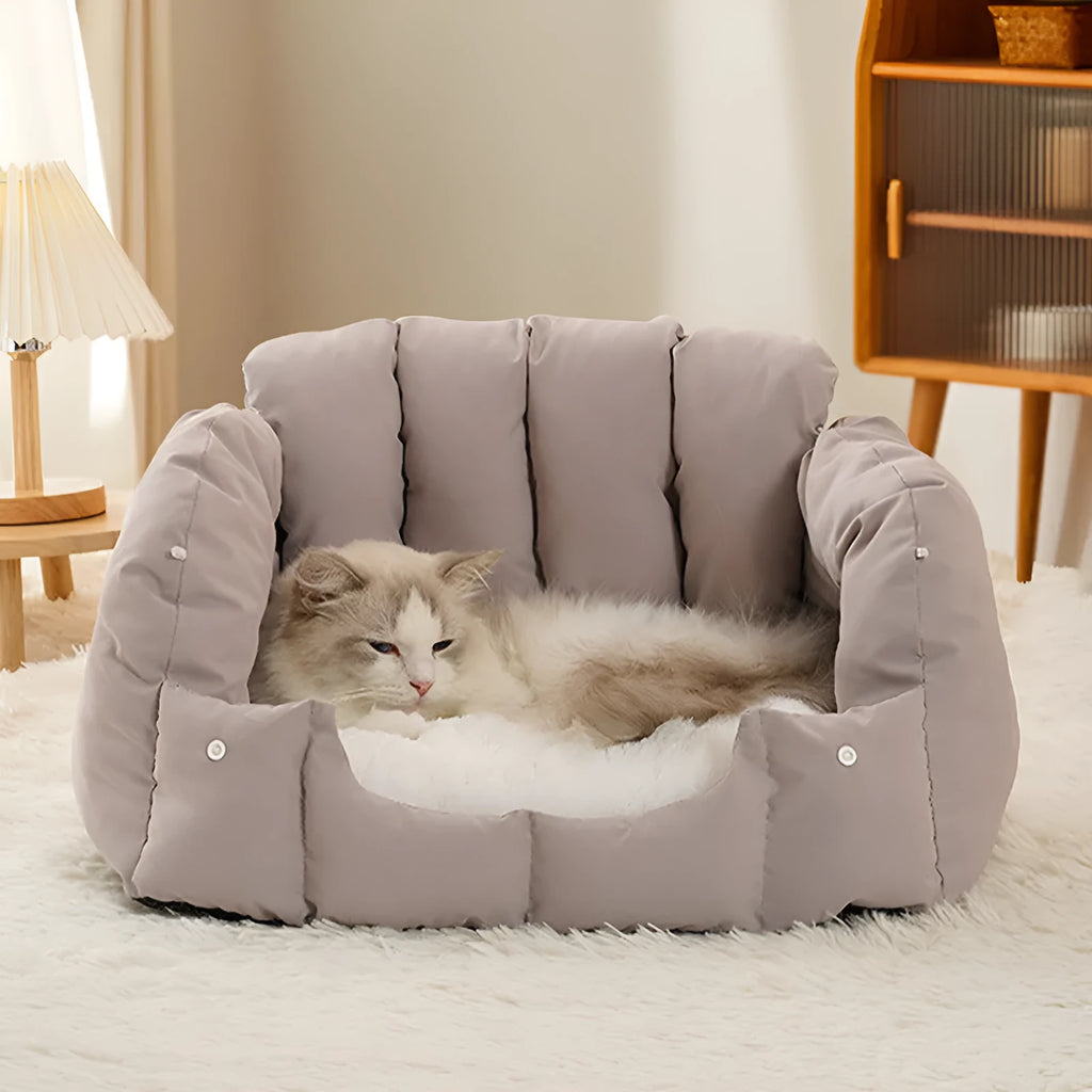 Grey dual-purpose arched pet nest shown as both an enclosed cat bed and an open sofa perch for dogs.