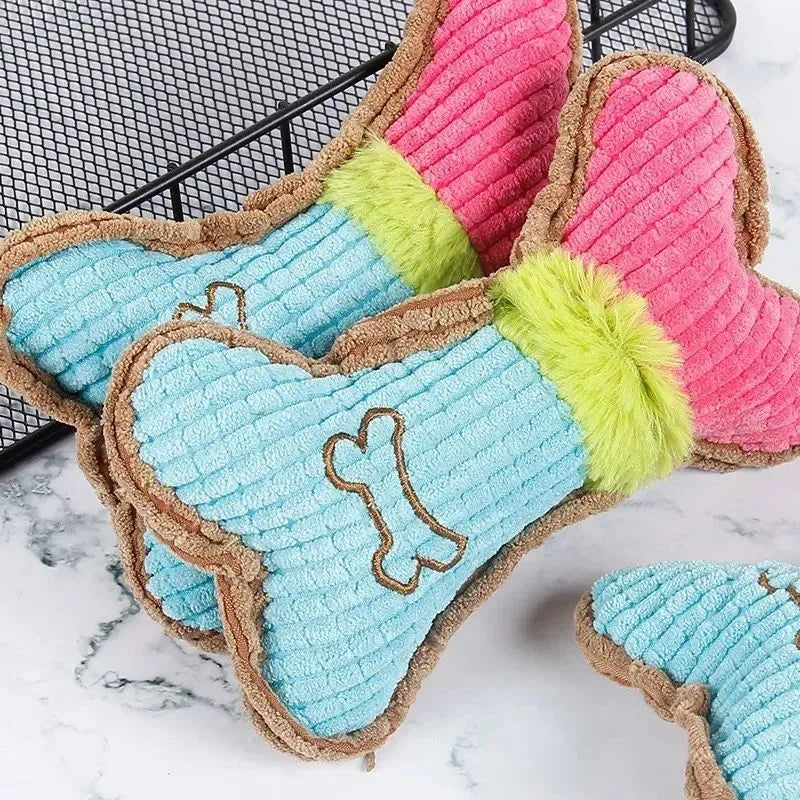 Three plush dog squeaky toys in assorted colours arranged together, showing 17cm size and soft fabric texture.