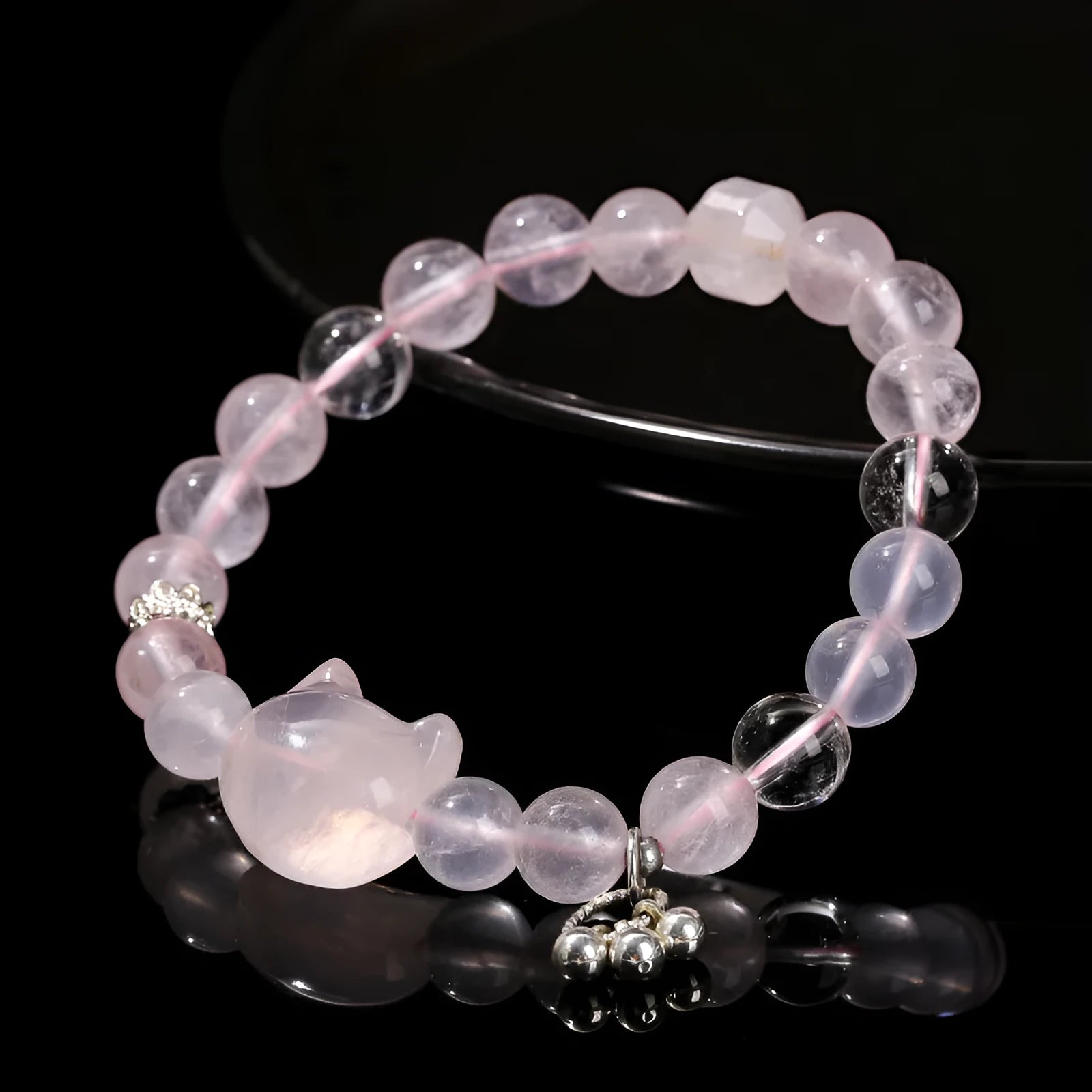 Women's natural gemstone charm bracelet with cat head design and copper detailing
