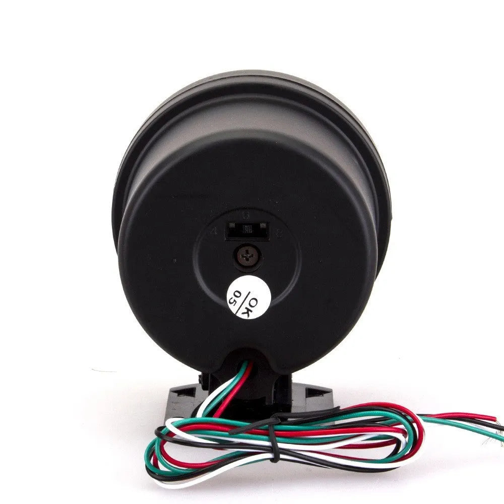 Black plastic automotive tachometer with blue light pointer display showing 0-8000 rpm range