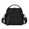 Nylon shoulder bag 25x11x23cm pillow shape with zippered compartment and outer pocket, available in brown, khaki, black, beige