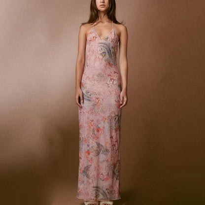 Floral print halter dress with spaghetti straps, slim silhouette, and butterfly back design, available in various colors