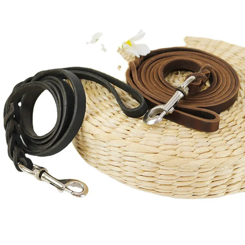 Thickened light brown cowhide leather dog leash with hand strap, shown at full length.