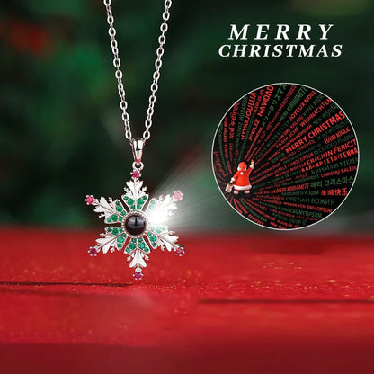 Sparkling copper snowflake projection pendant necklace with delicate chain, creating a magical winter wonderland display