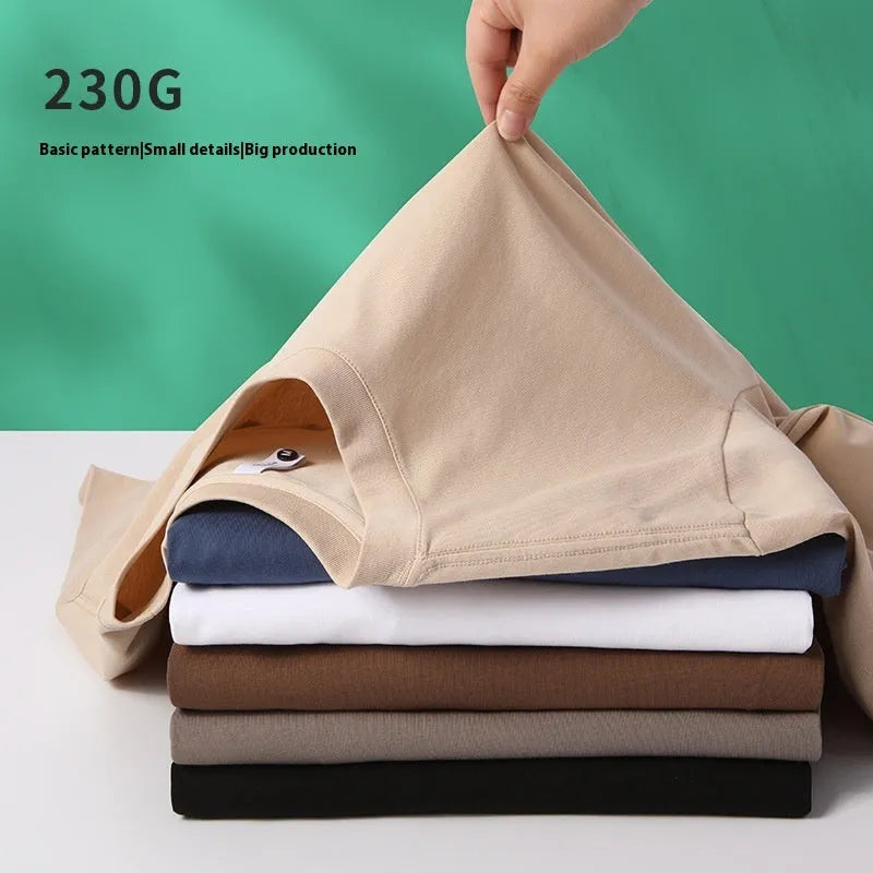 Heavyweight cotton blend T-shirt in drop shoulder design showing loose fit and round neck in multiple colour options