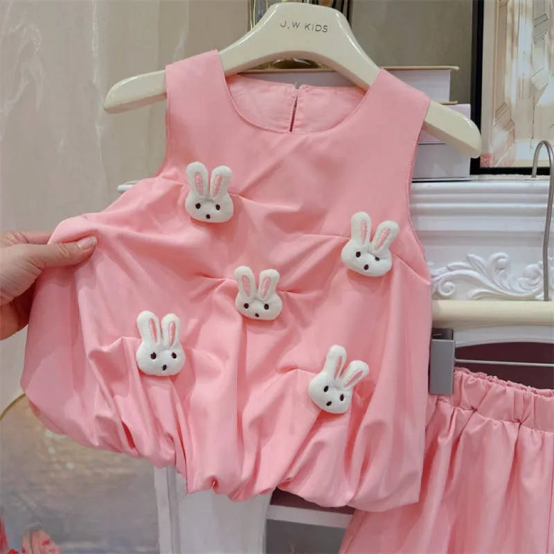 Cotton two-piece suit with long-sleeve shirt and pants, bud-shaped doll detail, pink or yellow, sizes 80-130 yards.