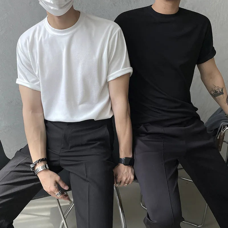 Men's slim fit plain cotton t-shirt in white on a hanger, showing round neck and half sleeve design.