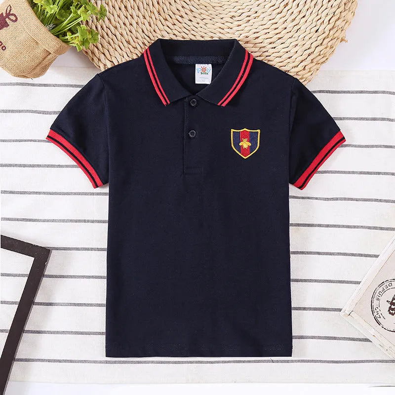 Boy's short sleeve cotton T-shirt with a lapel collar in a solid colour.