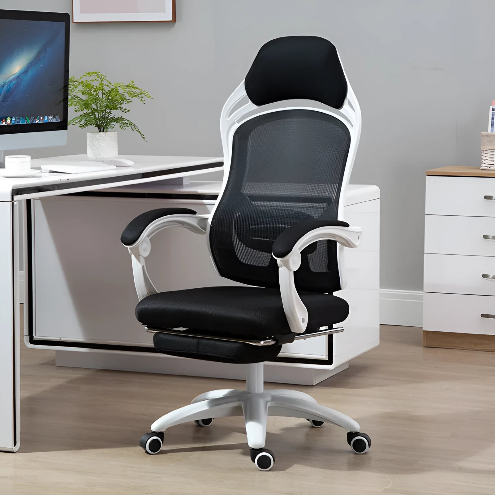 Black rotating office chair with linkage armrests and high resilience sponge seat cushion on nylon wheels