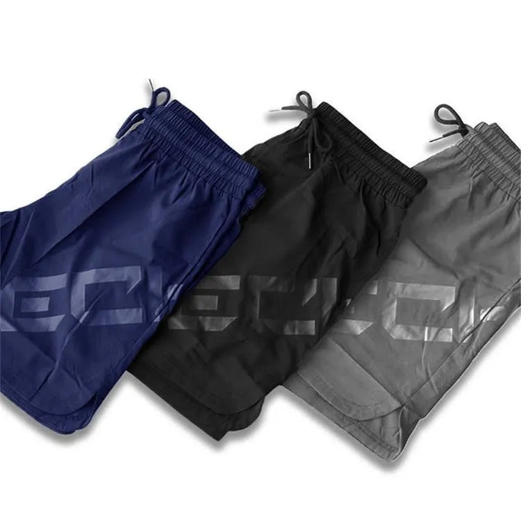 Men's elastic thin training running shorts in quick-drying nylon blend fabric, knee length design in black colour