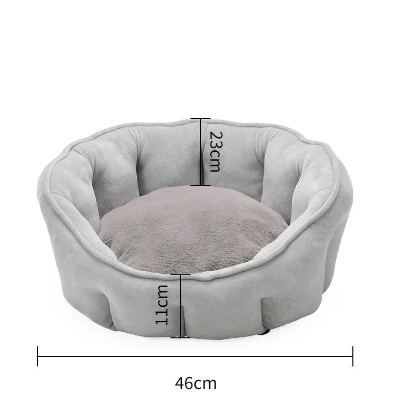 Grey plush cat kennel mat showing enclosed design with raised sides and soft interior.