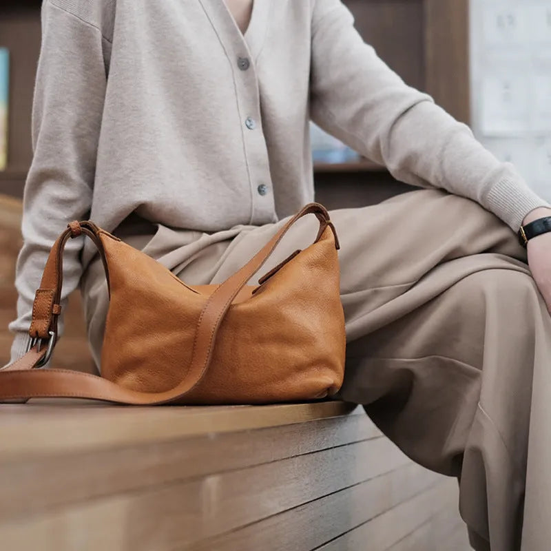 Genuine leather dumpling shoulder bag with wide strap in retro tan or retro black for women daily wear