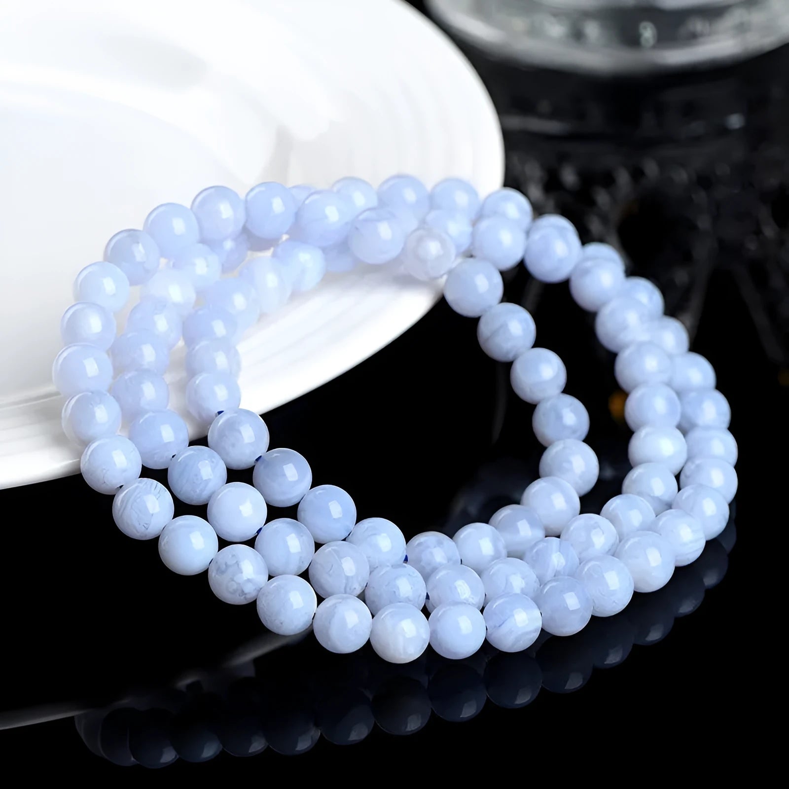 Handmade blue agate bracelet with natural pattern agate balls and striped scattered beads.