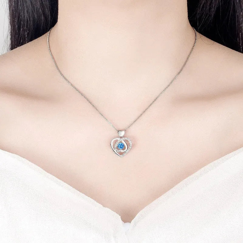 Blue copper necklace and bracelet set with heart-shaped gemstone pendant on a geometry design chain