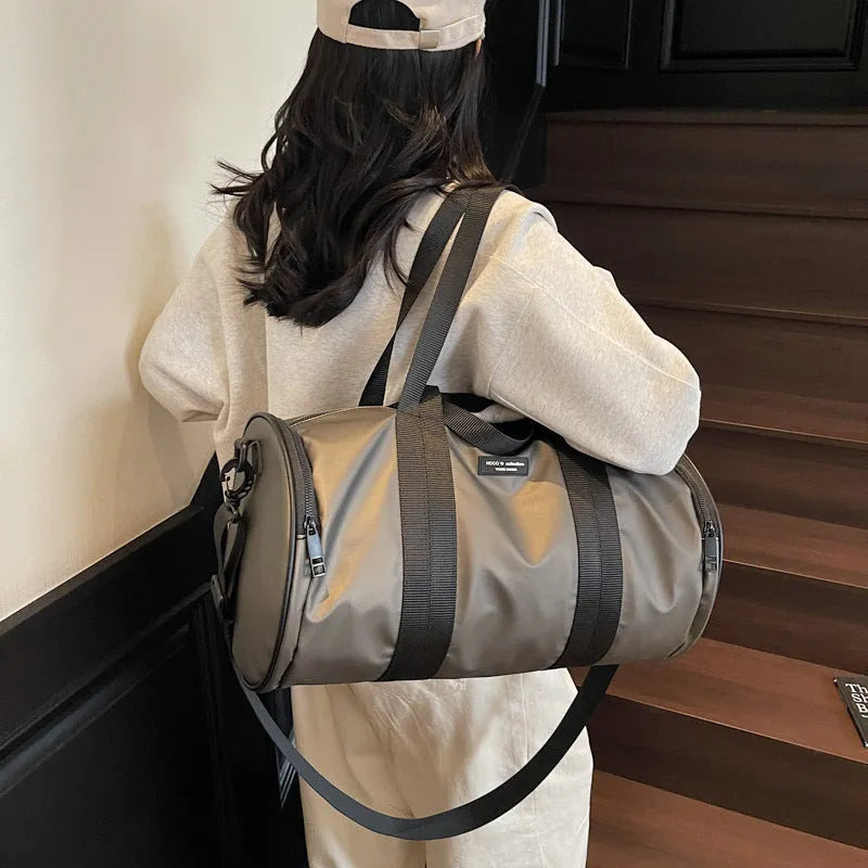 Unisex waterproof Oxford cloth sports handbag in black, dark gold, or dark grey for leisure travel