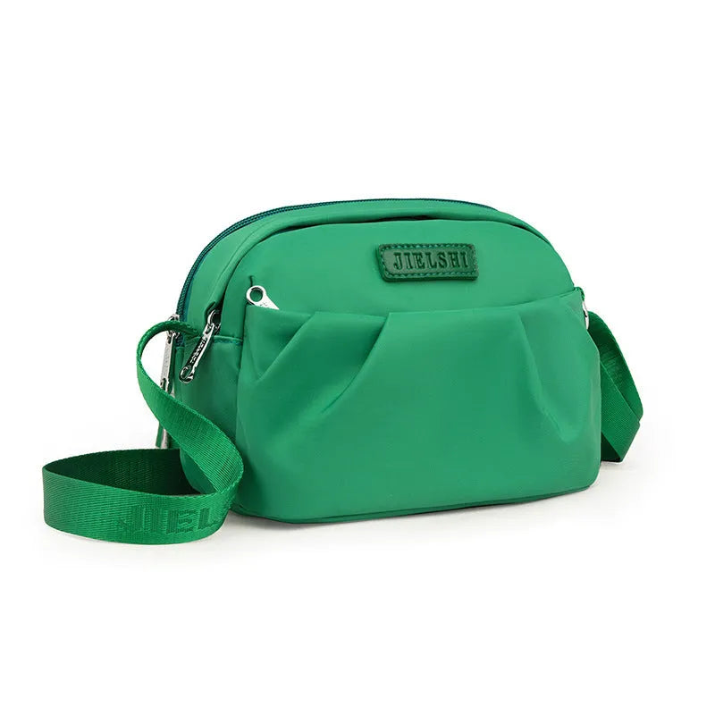 Pleated oxford cloth messenger phone bag with zip compartments in ten colour options