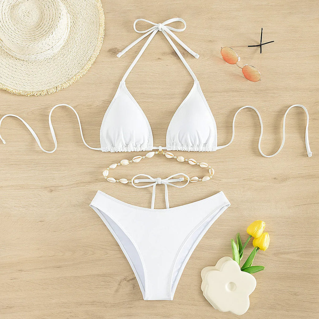 Women's black halter neck lace-up swimsuit bikini briefs on white background