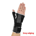 Black carbon fibre sports wrist guard with grey edging and an adjustable thumb strap for left or right hand.