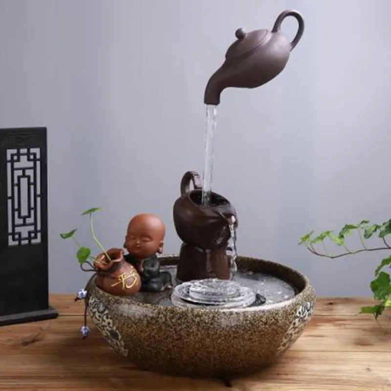 Chinese teapot suspension faucet ornament with atomisation function and 220V US plug, decorative desktop piece.