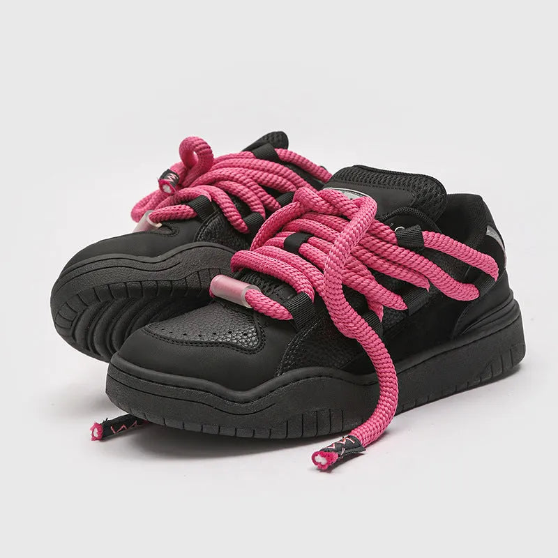 Casual lace-up trainers with thick rubber sole and mesh detailing in denim blue colour.