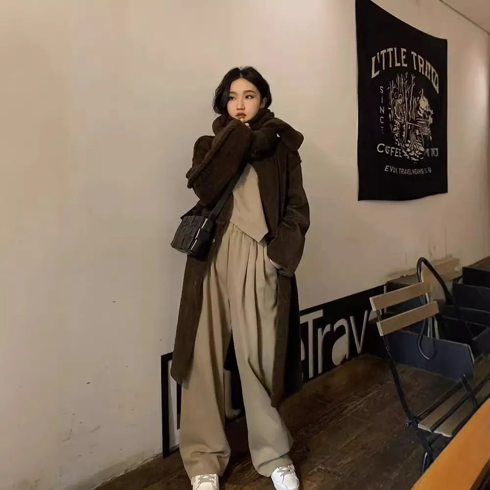 Women's khaki polyester casual sports suit two-piece set with long sleeves and trousers.