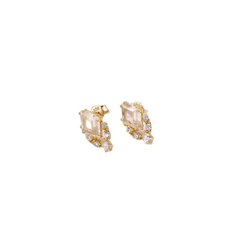 Geometric silver earrings with natural white crystal studs