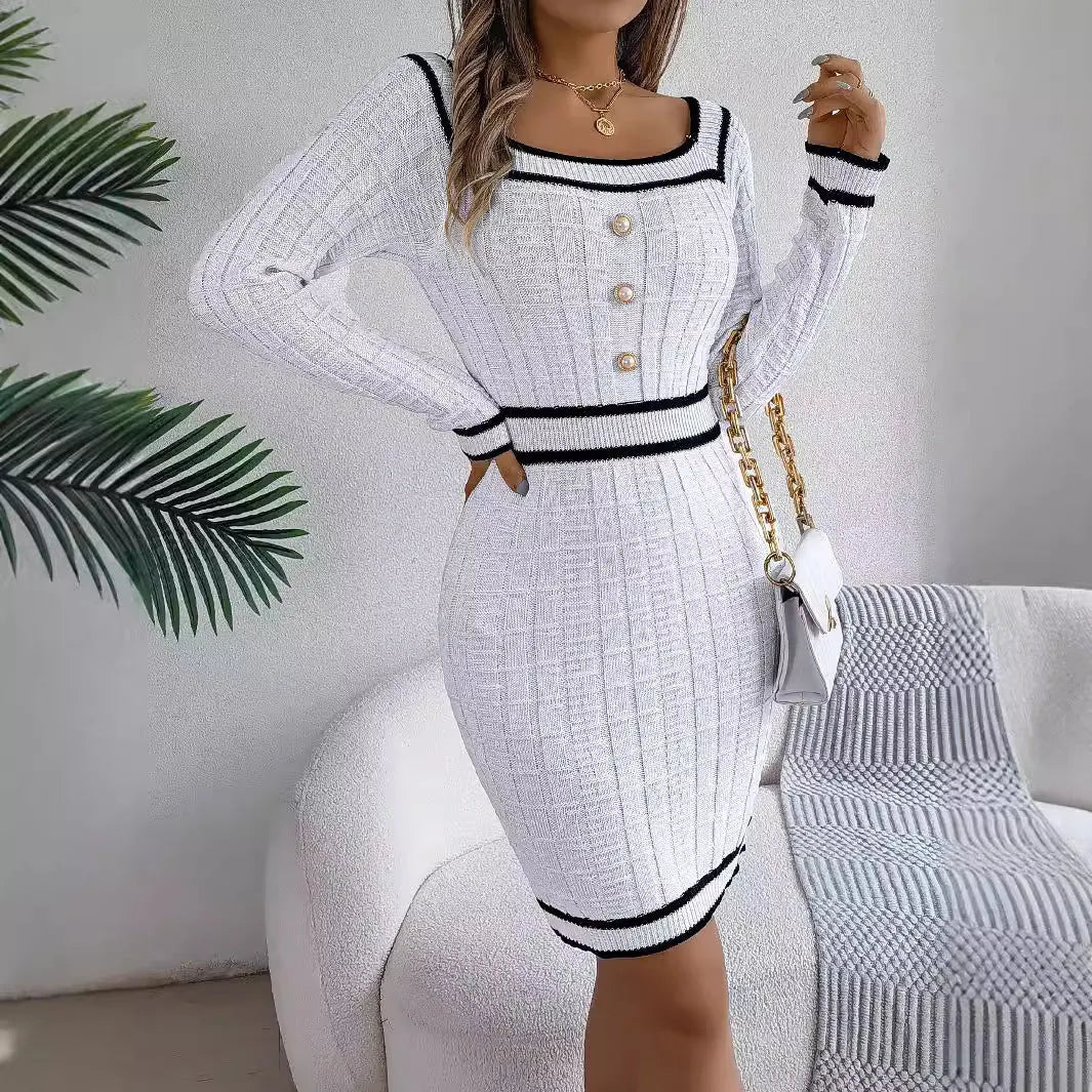 Women's long-sleeved organic cotton sweater dress with lantern sleeves and an A-line hip skirt.