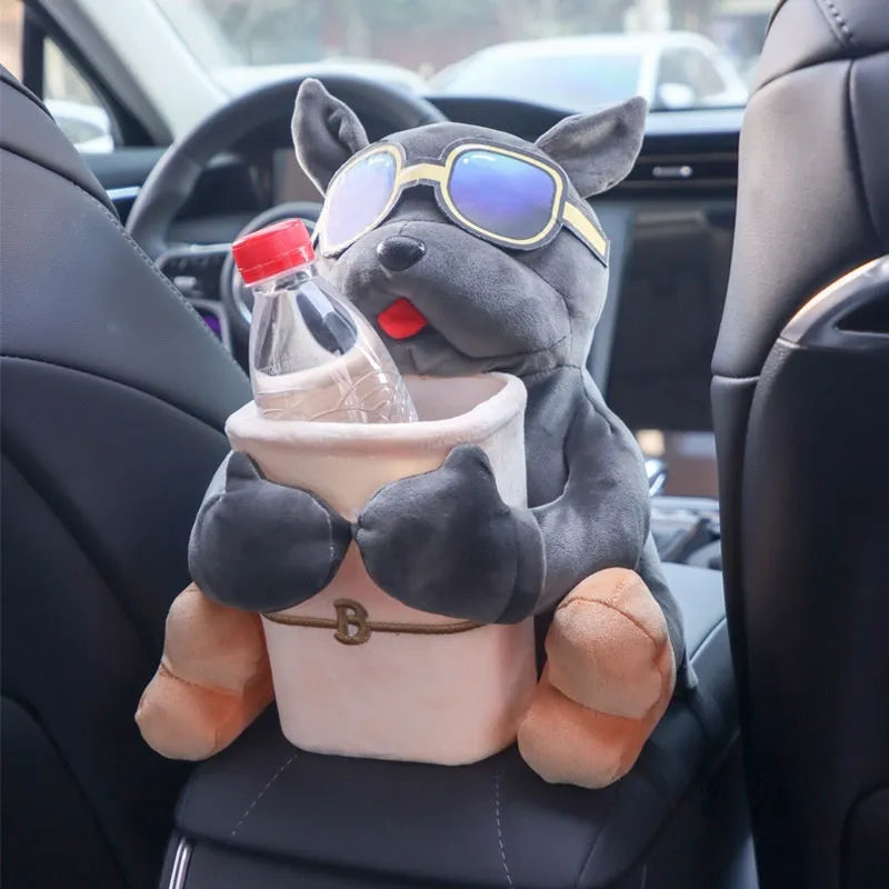 Plush car tissue box holder hanging in flip armrest compartment with dog character design