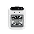Compact ivory white portable USB air cooler with touchscreen display on a desk.
