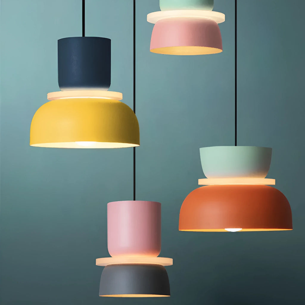 Nordic minimalist iron pendant light with a long fabric cable in a colour-matched finish.
