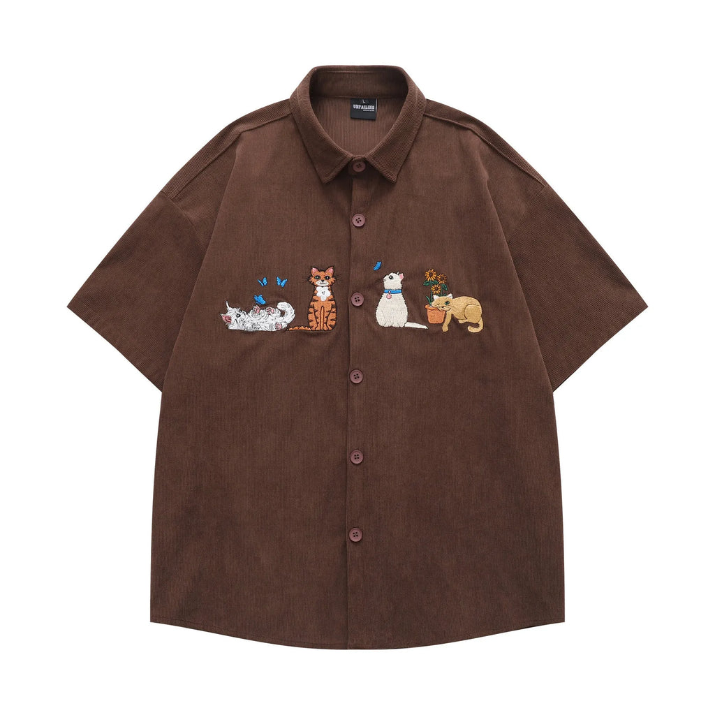 Loose couple shirt with cartoon pattern and embroidery detail in apricot colour