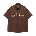 Loose couple shirt with cartoon pattern and embroidery detail in apricot colour