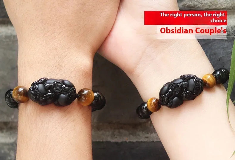 Black Mexican Gold Sheen Obsidian Pi Xiu charm bracelet with crystal beads.