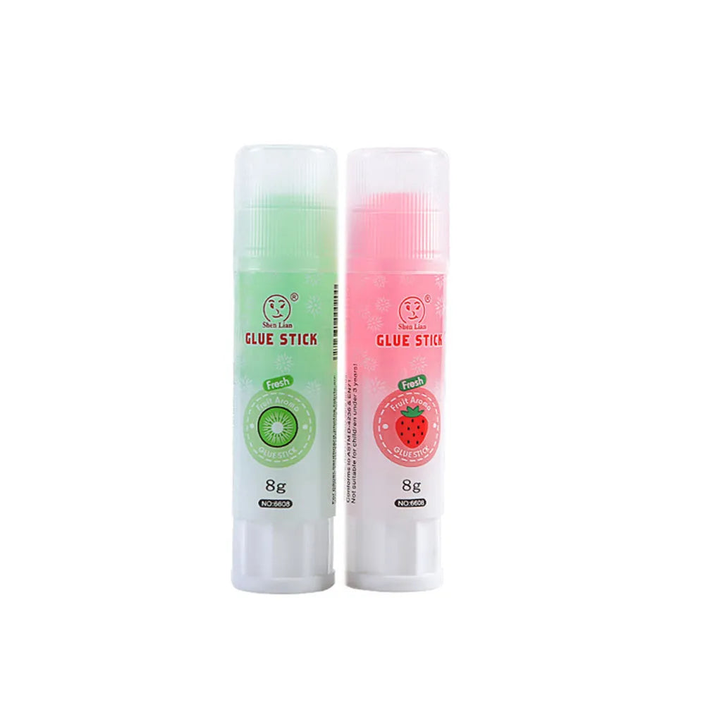 Jelly fruit fragrance solid glue stick in random colour, 8.5cm long, for students and crafts.
