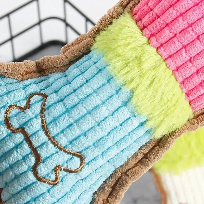 Three plush dog squeaky toys in assorted colours arranged together, showing 17cm size and soft fabric texture.