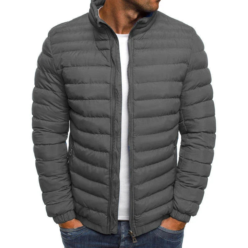 Insulated men's jacket in various color options with features like zippered pockets, long sleeves, and padded lining for warmth and versatility