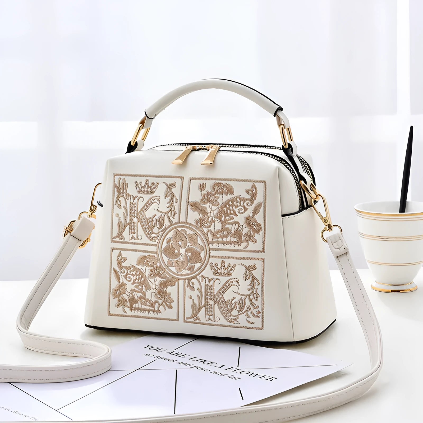 Women's PU cross-body shoulder bag with embroidery in horizontal square shape and external slit pocket