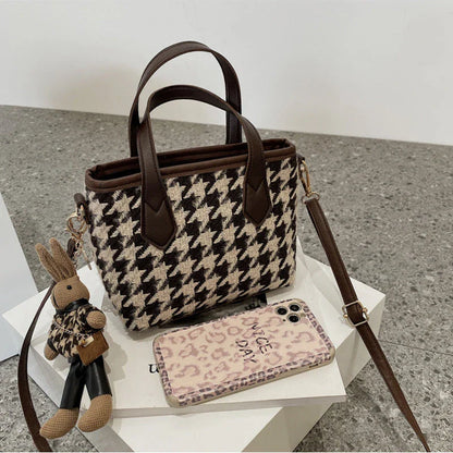 Stylish houndstooth shoulder bags in various colors, featuring a spacious square shape, adjustable strap, and classic checkerboard pattern.