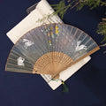 7-inch bamboo folding silk embroidered fan showing traditional Chinese embroidery designs