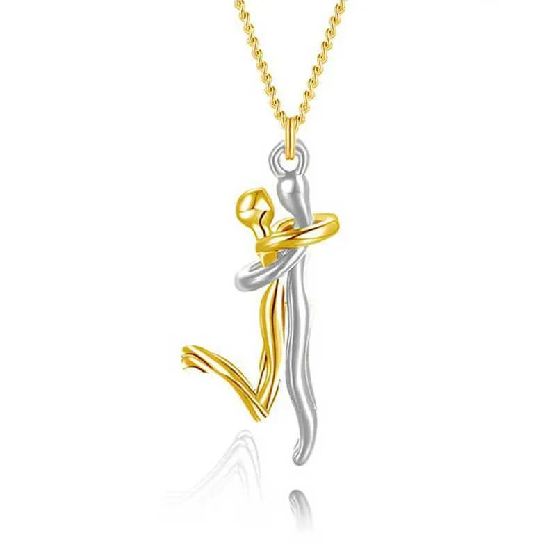 Copper couple's humanoid hug pendant necklace in electroplated gold with curbs chain