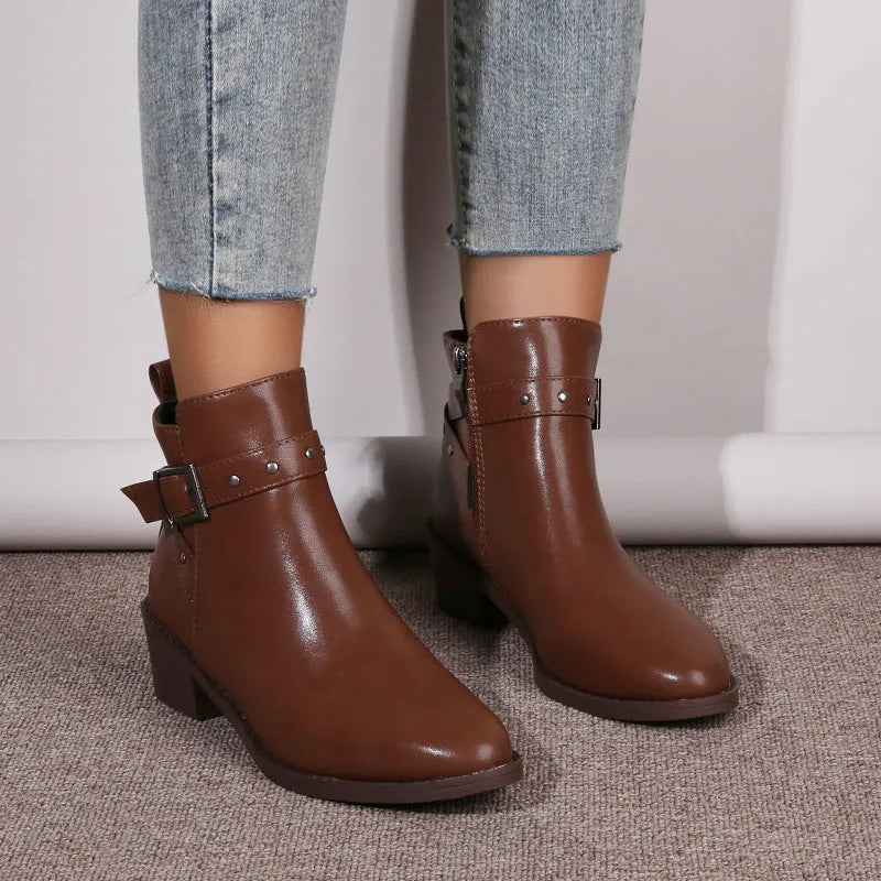 Retro chunky heel studded buckle pointed toe Martin boots in faux leather, black colour, block heel, rubber sole.