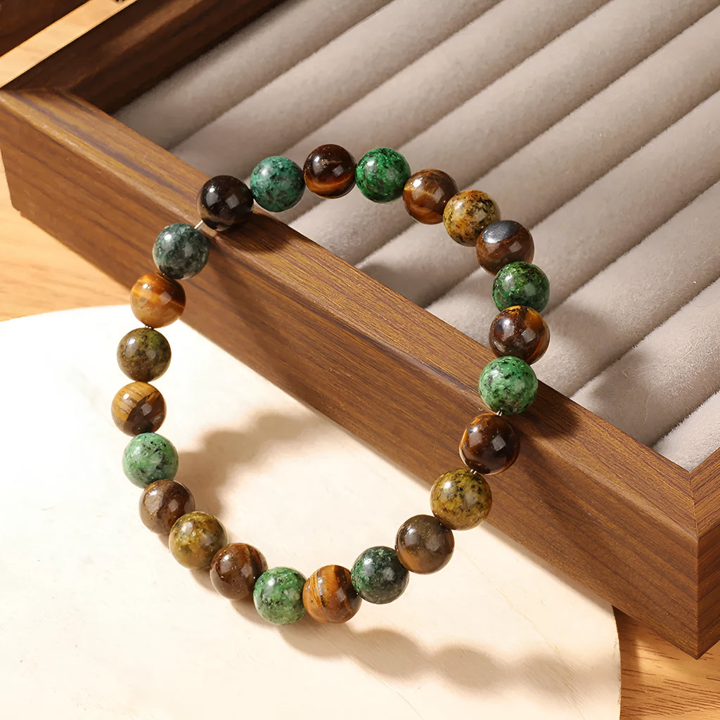Tigereye stone bracelet with antique flower design measuring 18mm