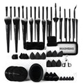 33 piece black makeup brush set with eye shadow brush and black brush bag on surface
