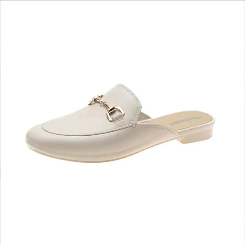 Women's PVC closed toe half slippers with buckle fastening in milky white